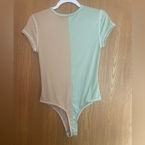Split color Rue21 Women’s Medium Body Suit NWT